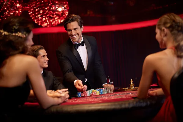 A confident dealer surrounded by casino chips inviting players to access their CAWABANGA account, reflecting quick and easy login options.